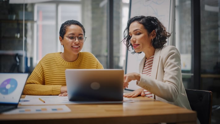 Marketers reviewing data (Source: AdobeStock_415116208)